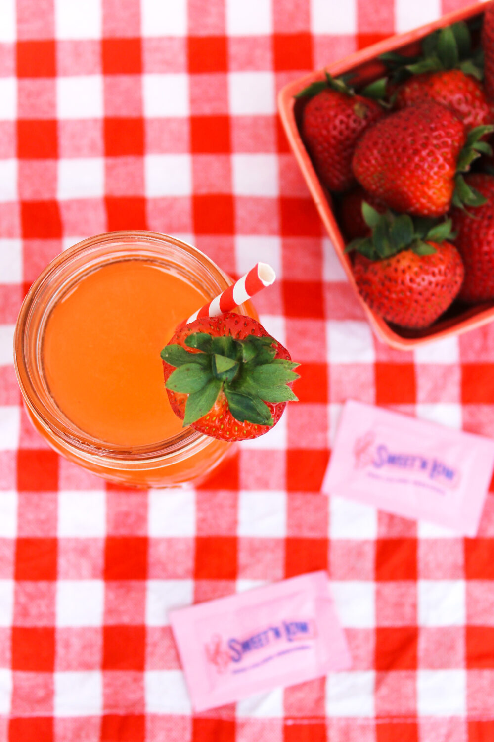 This spiked strawberry limeade is the perfect summer cocktail! It's the ideal drink to serve at bridal showers, BBQs, and summer brunch! 