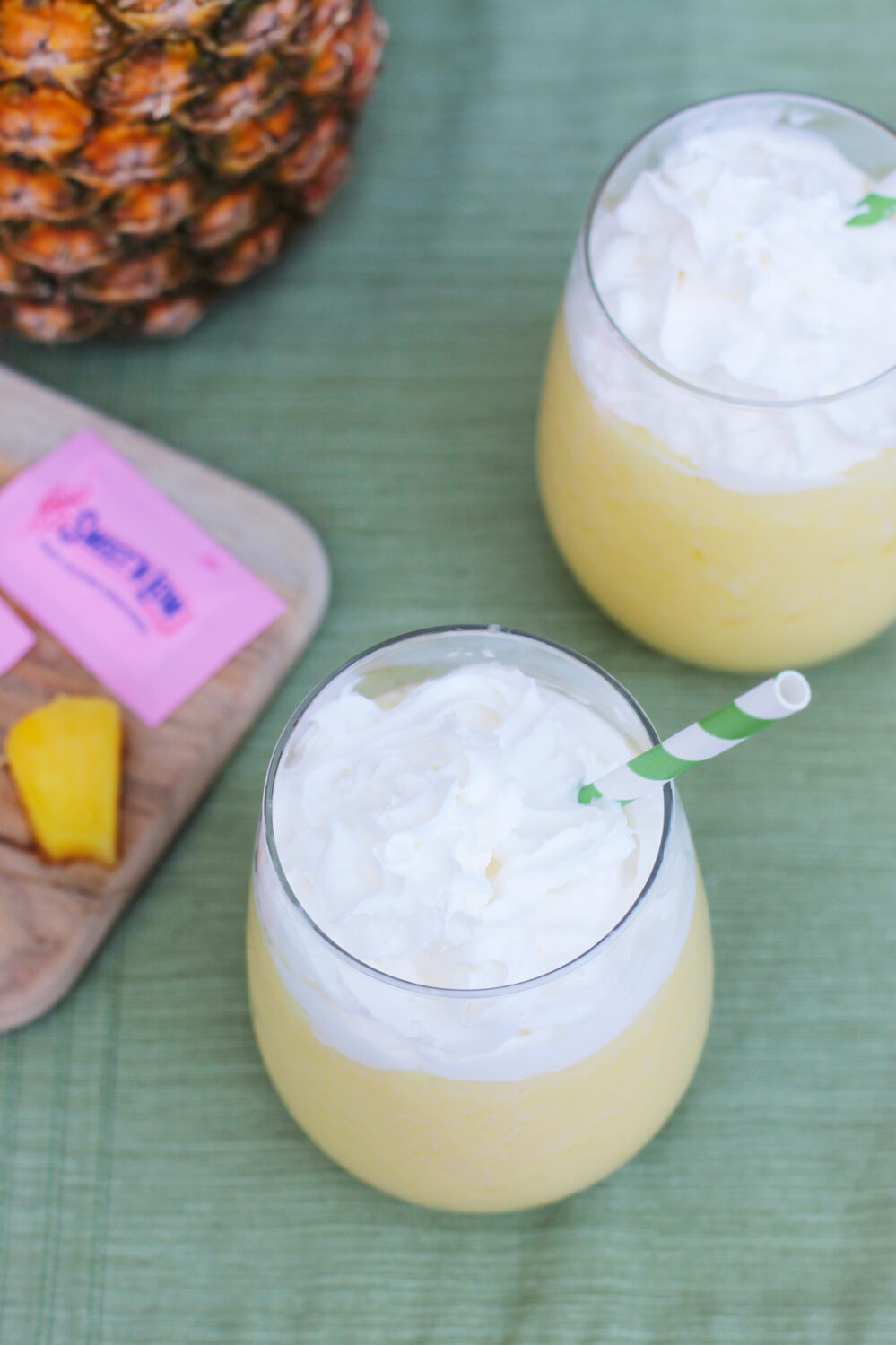 This Spiked Dole Whip cocktail recipe is perfect for warm summer nights! #donthesitaste #ad