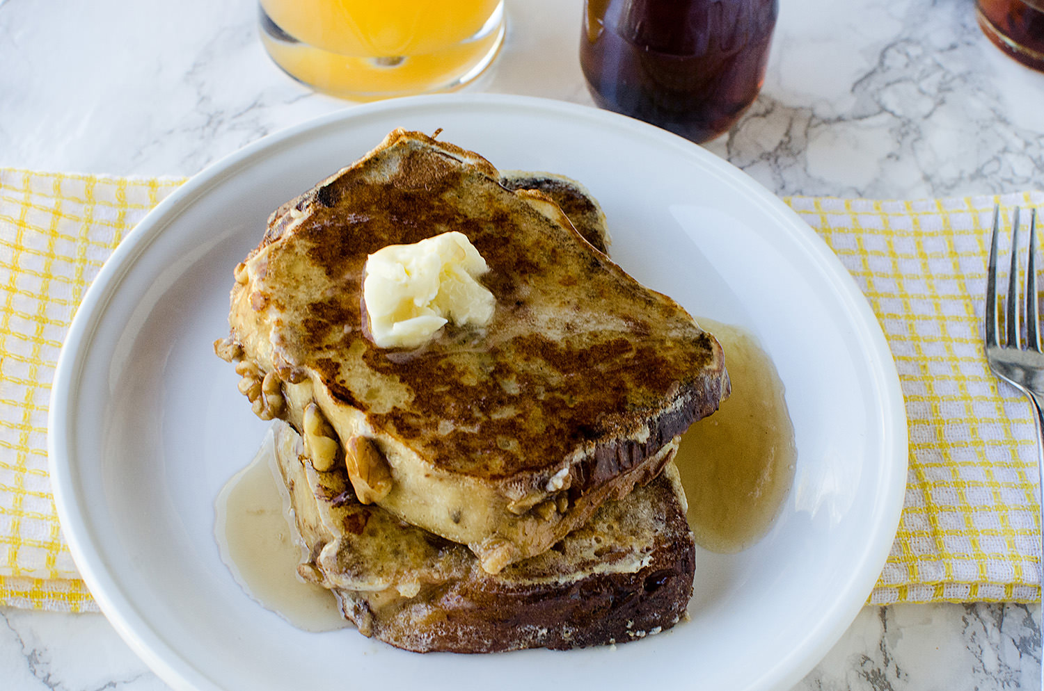 Breakfast about the only thing your kids will eat? Yup, us too. Lifestyle blogger Carly from Lipgloss & Crayons shares this banana bread french toast is delicious at any time of day!