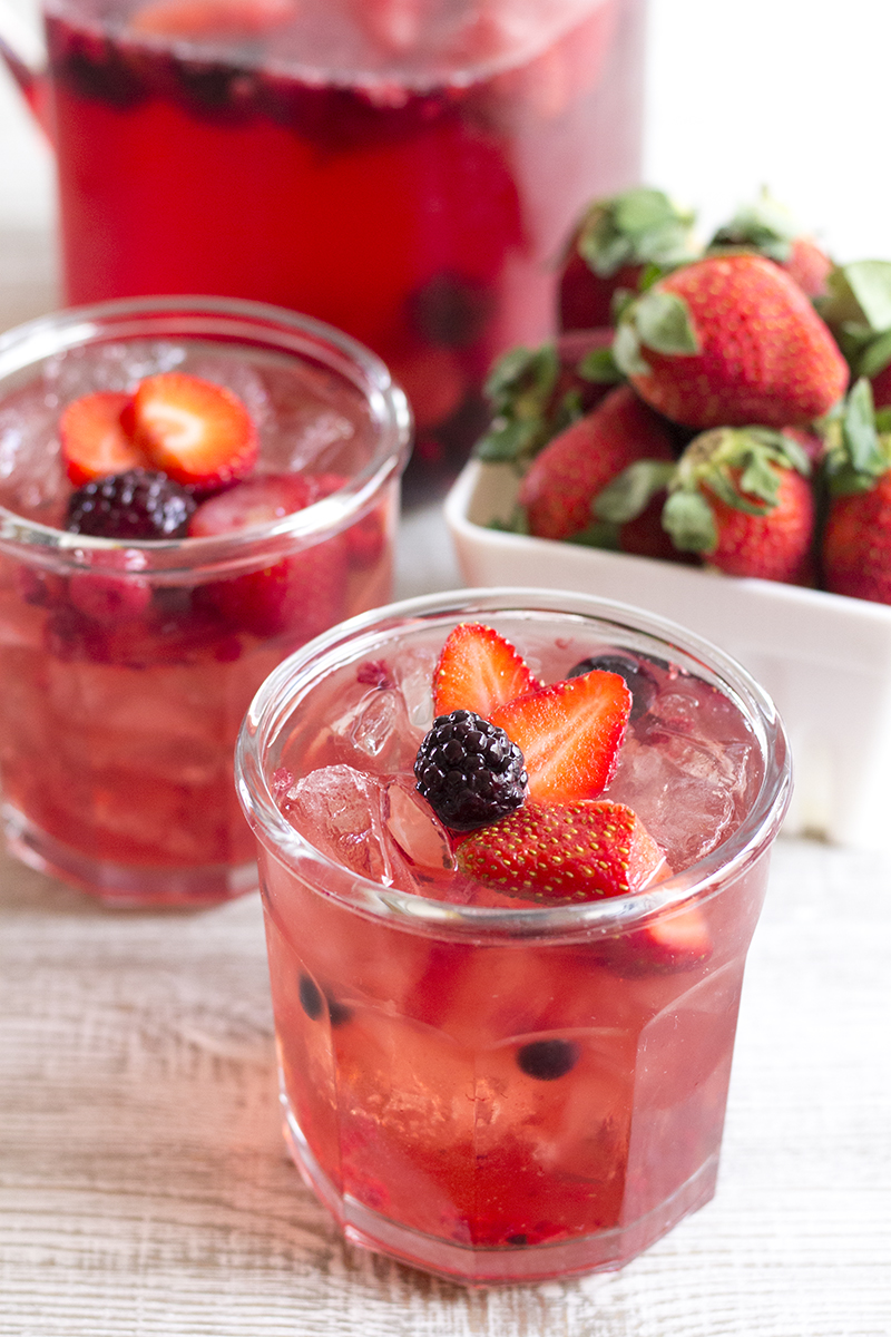 This Red Berry Pomegranate Punch is an easy to make cocktail that's perfect for serving a crowd!