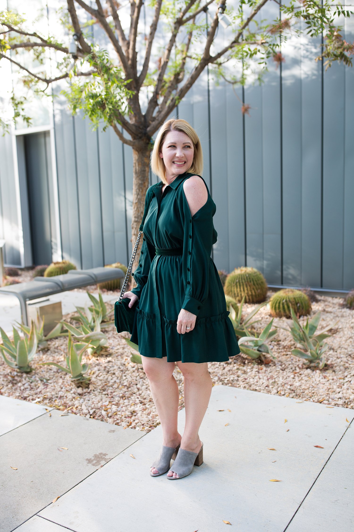 Searching for holiday dresses? I love this green cold shoulder dress for Christmas parties!