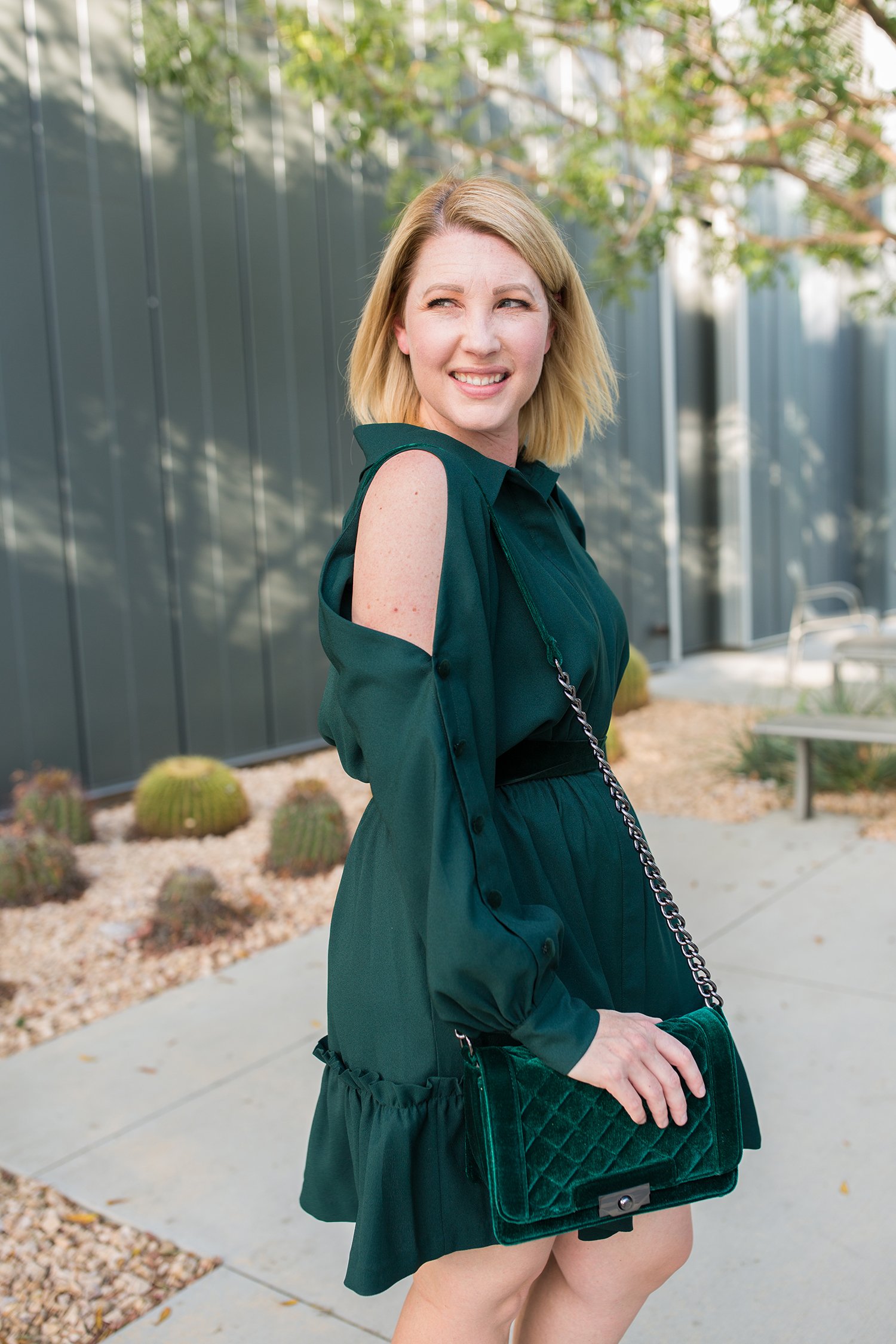 On the search for holiday dresses? This cold shoulder dress is flattering, easy to wear and the perfect holiday color!