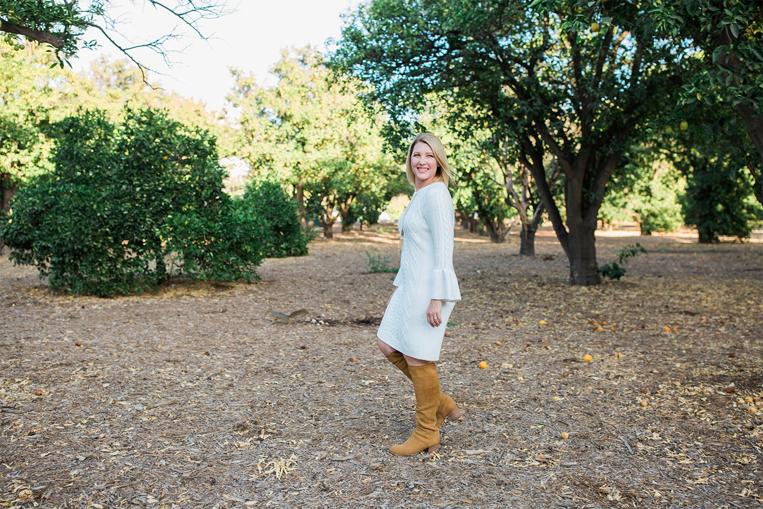 I love this white sweater dress as a casual holiday dress option!