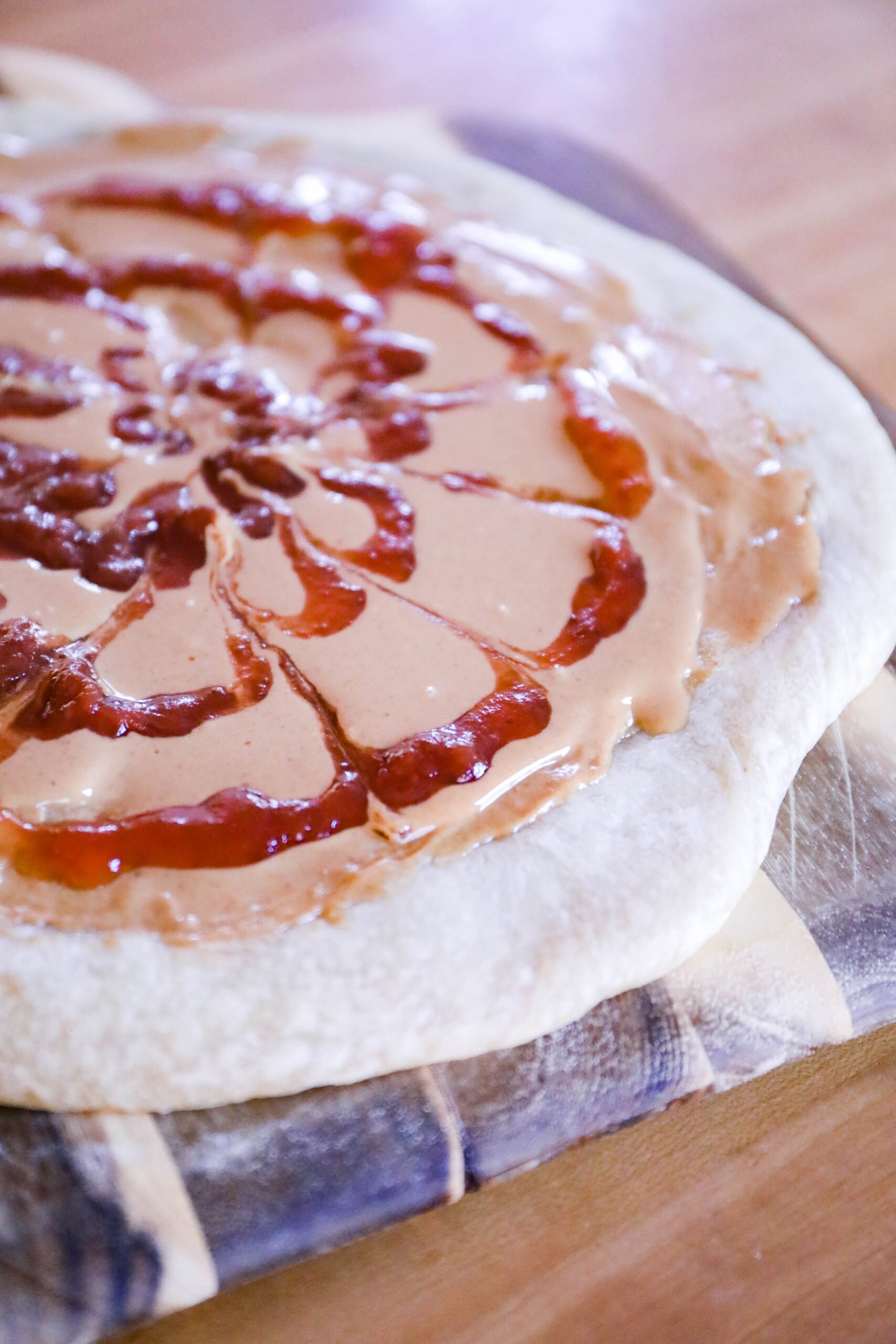 Have you had the Peanut Butter and Jelly pizza at Goofy's Kitchen? This copycat recipe is just like the real thing!