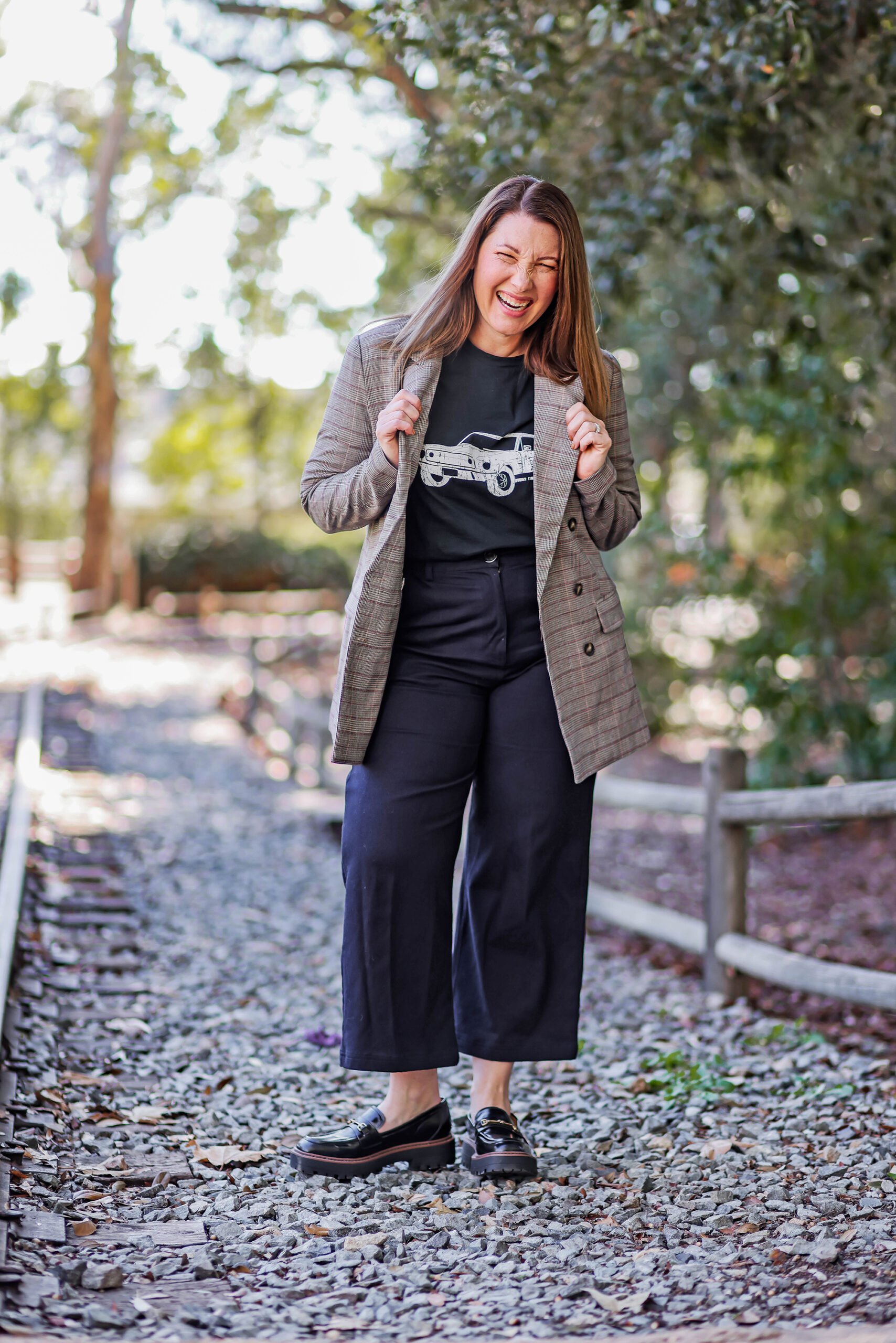 Looking for a business casual version of your best loafers outfits? I love these wide leg pants and plaid blazer with a graphic tee!